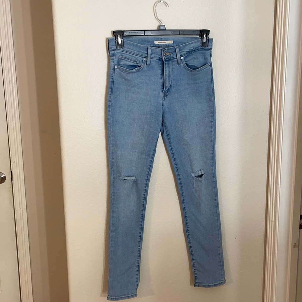 Levi’s slimming skinny torn jeans